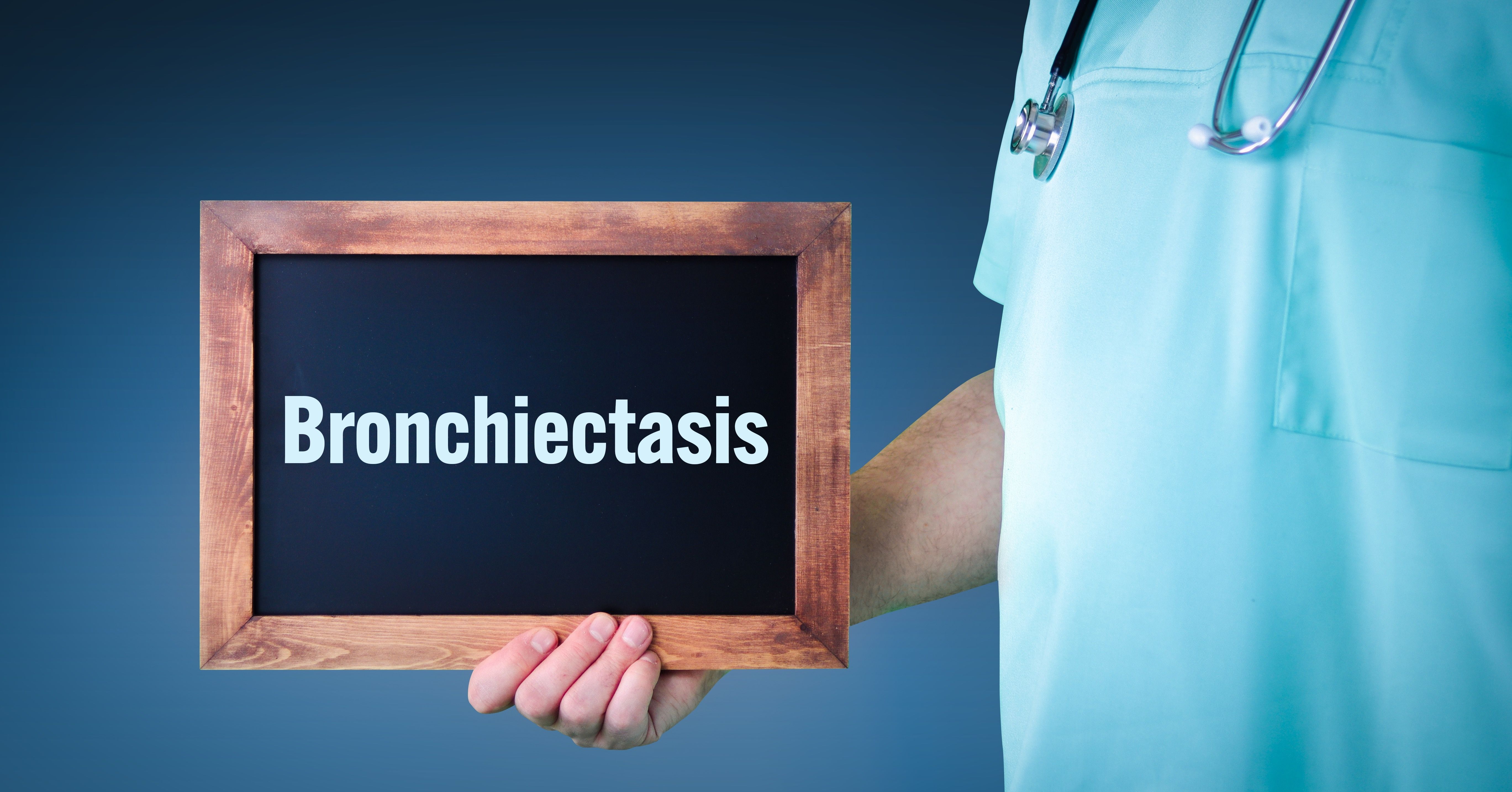 Doctor holding "bronchiectasis" board | Image Credit: MQ-Illustrations - stock.adobe.com