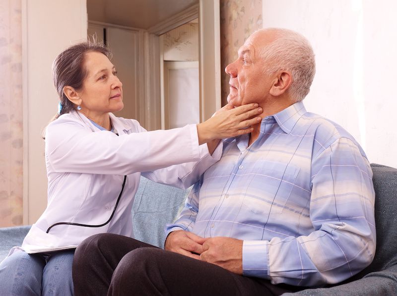doctor and patient at home 
