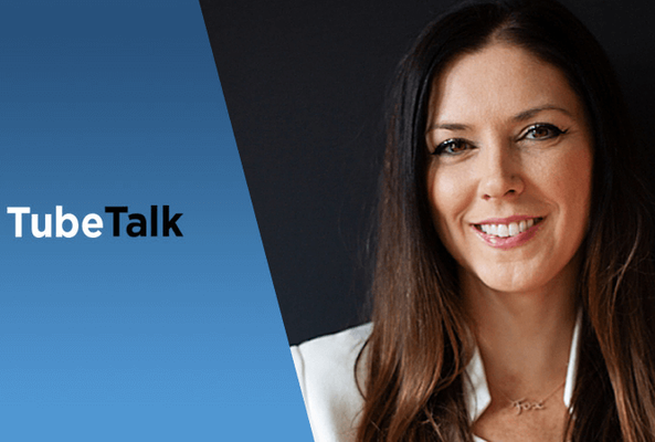 Smiling woman next to TubeTalk logo on blue and black background for video podcast branding