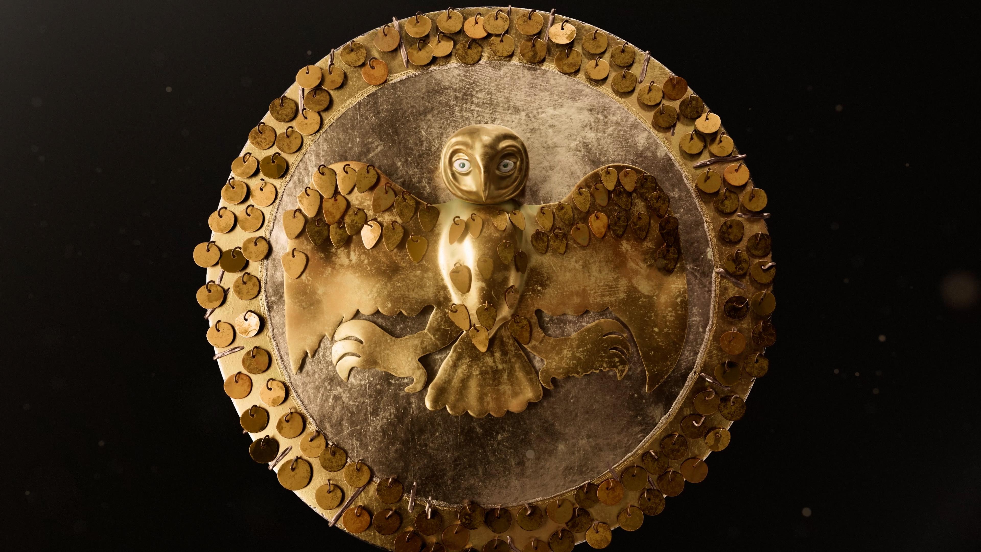 Gilded copper owl secured to a silvered copper disk