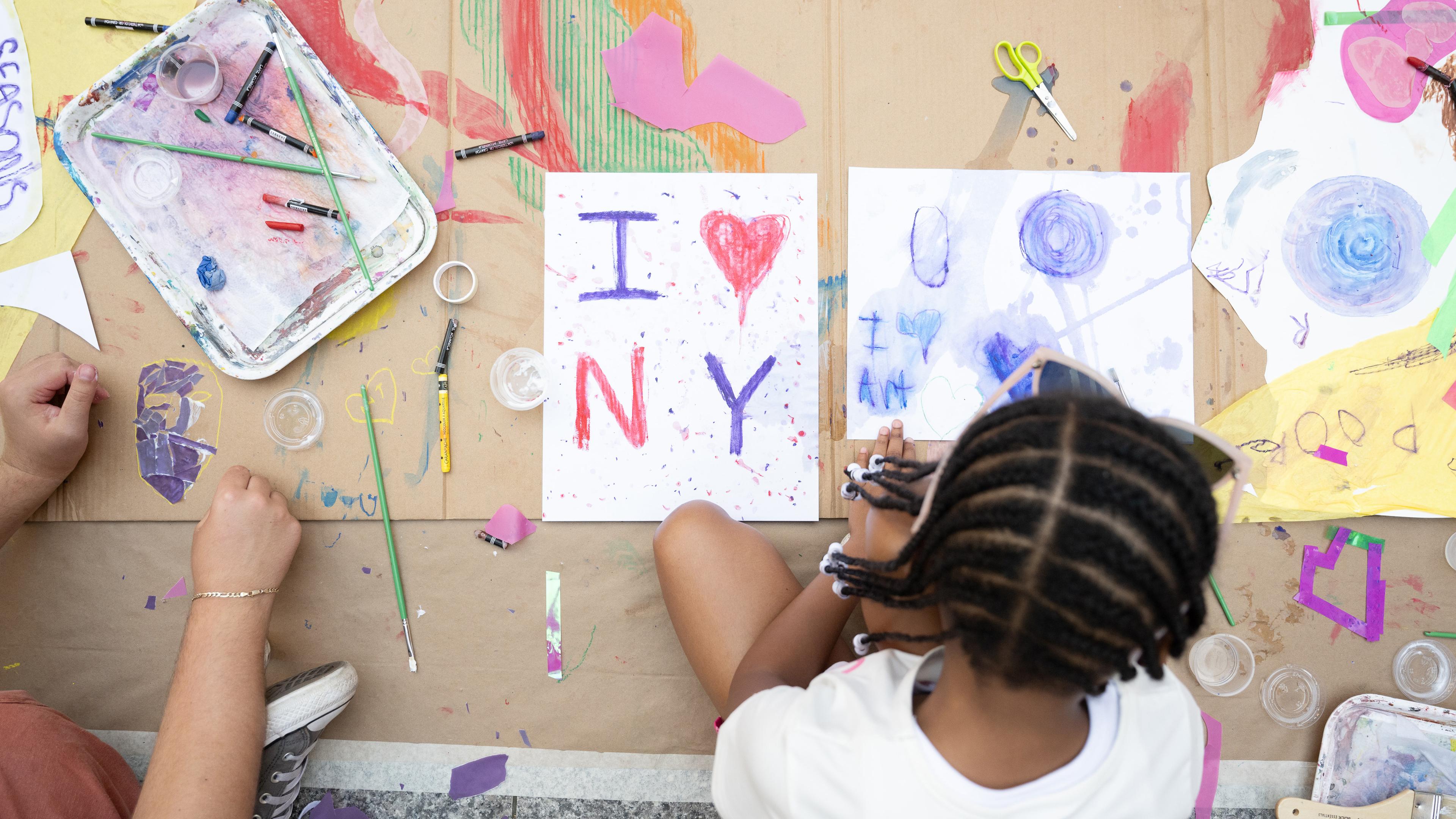 A child making art.