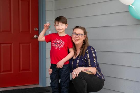 Johnson Village Celebration for Two Habitat Homeowners