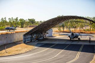 A Royal Australian Air Force (RAAF) F-35A Lighting II taxis around a US Air Force F-22 Raptor as part of Talisman Sabre 23, RAAF Base Tindal, July 2023.