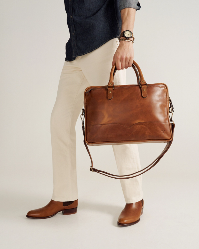 image of man carrying briefcase