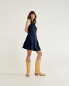 Full view of Women's Sleeveless Collared Mini Dress - Navy on model