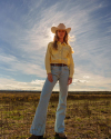 Closeup detail view of Women's Mid-Rise Bootcut Jeans - Light